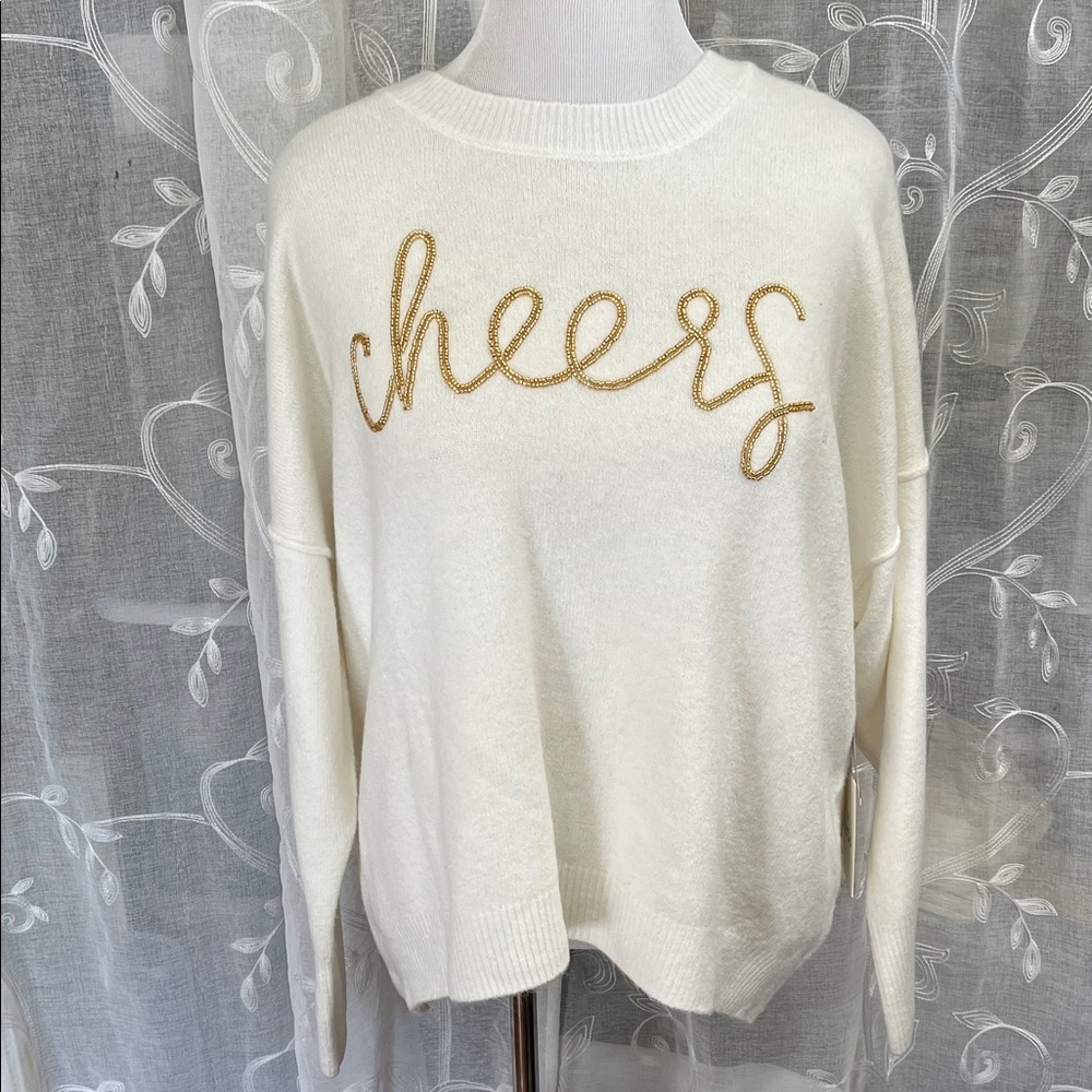 CeCe Women's Cream Sweater with Gold Script